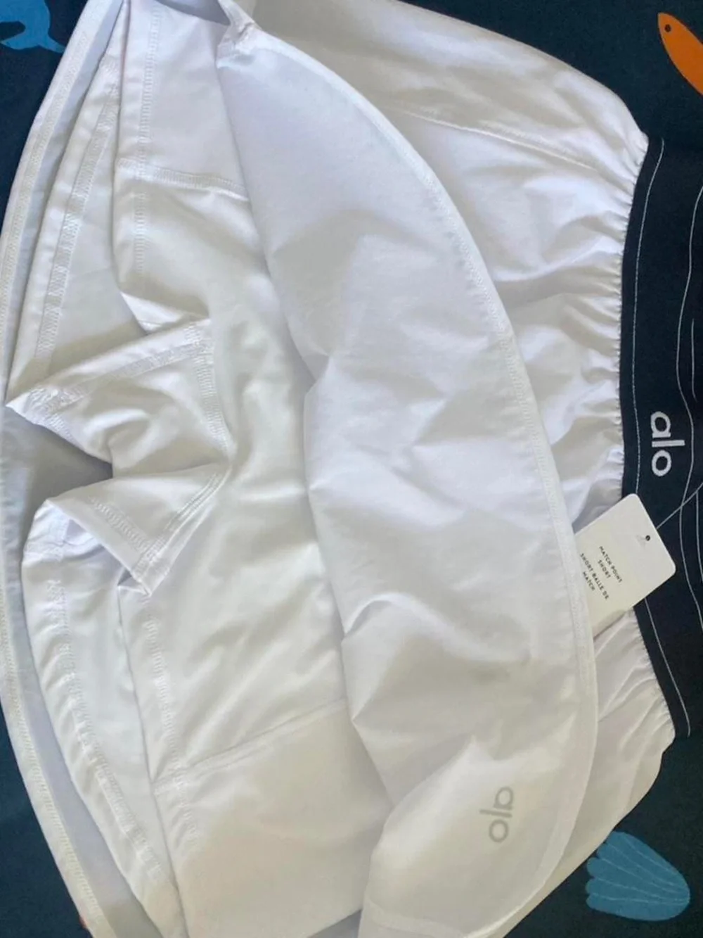 ALO Yoga White Mini Skirt with Black Waistband